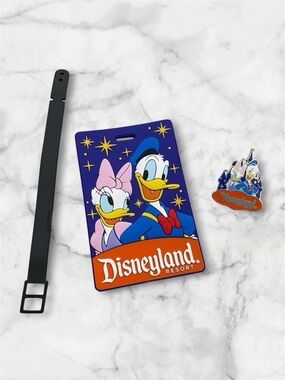 Disneyland Resort Purple and Orange Donald and Daisy Luggage Tag and Pin Set